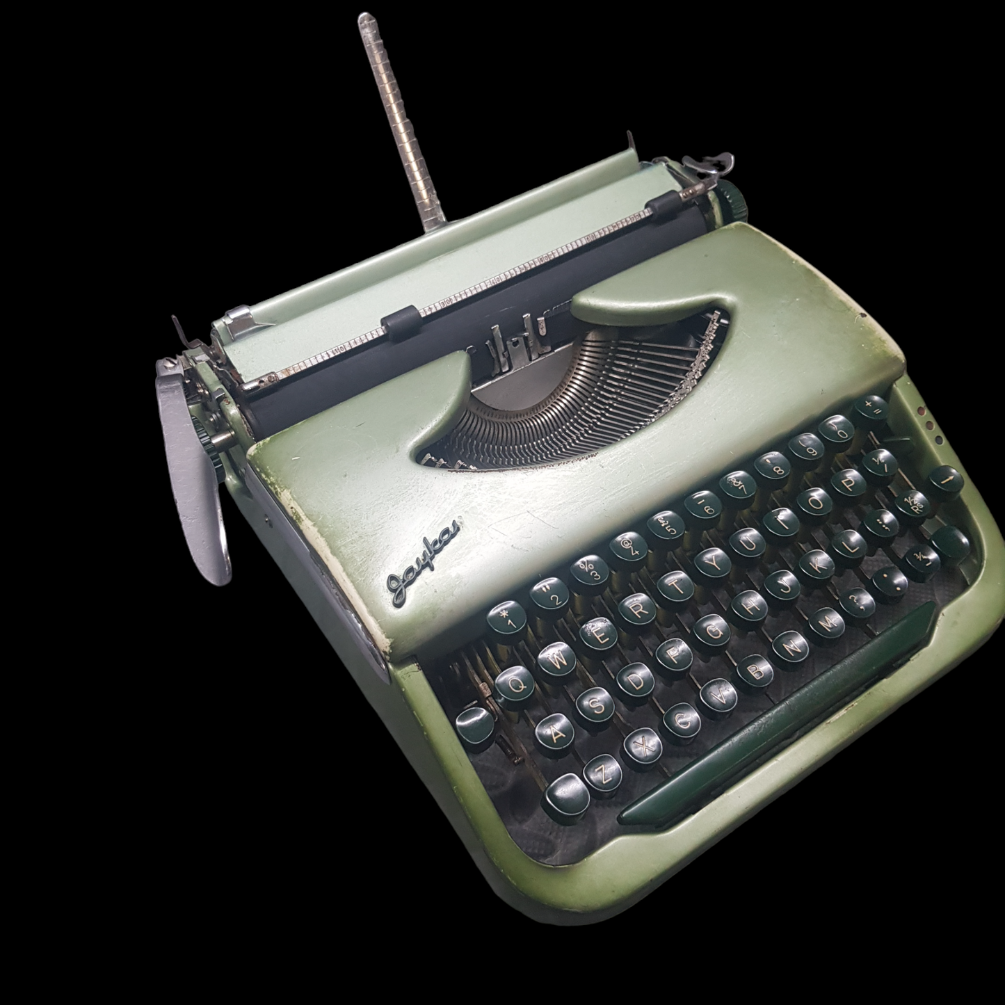 Image of Jaykay Typewriter. Portable Typewriter. Original Parrot Green. Made in India. Available from universaltypewritercompany.in