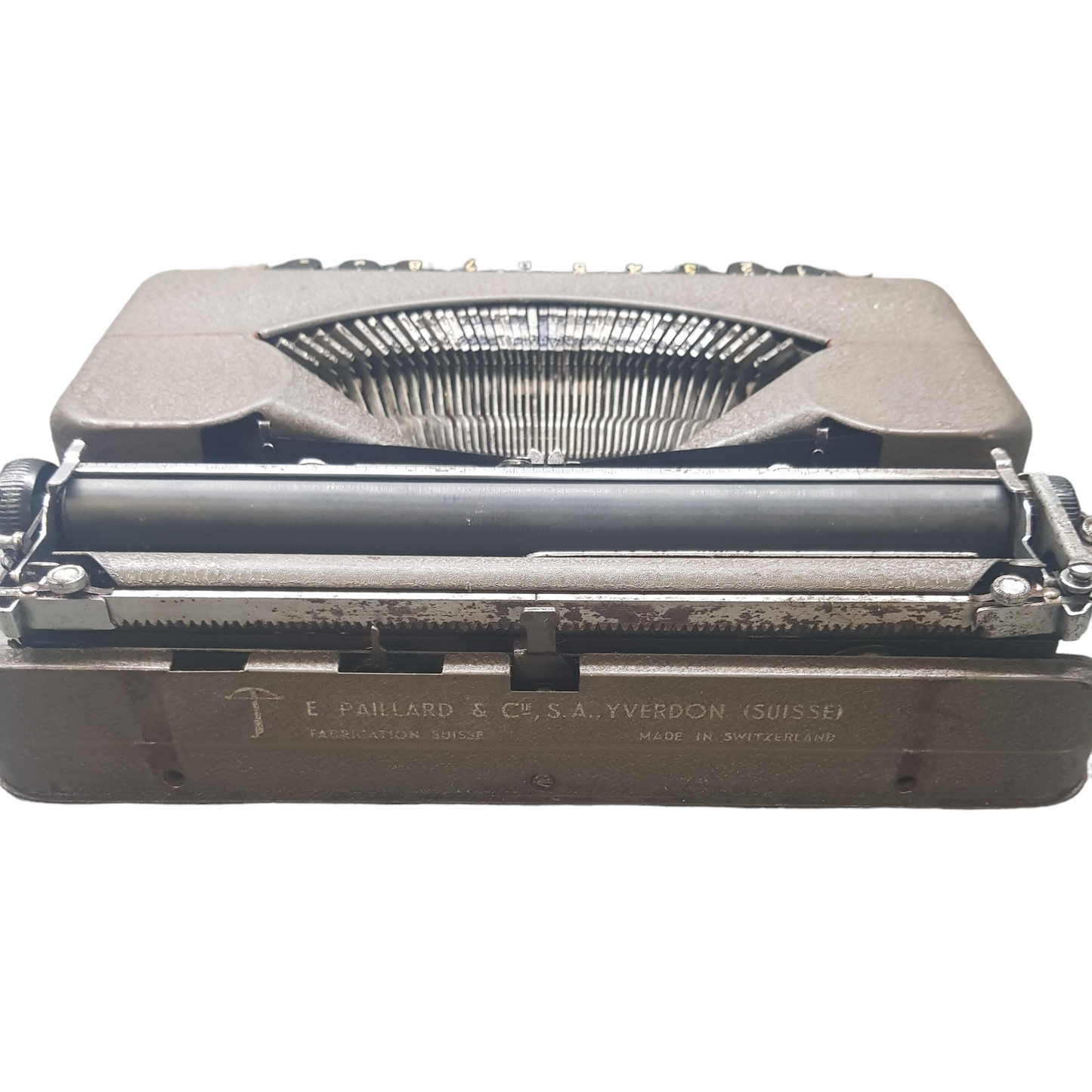 Image of Hermes Baby Old Typewriter. Portable Typewriter. Original Dark Grey. Swiss Made. Available with cover. Available from universaltypewritercompany.in