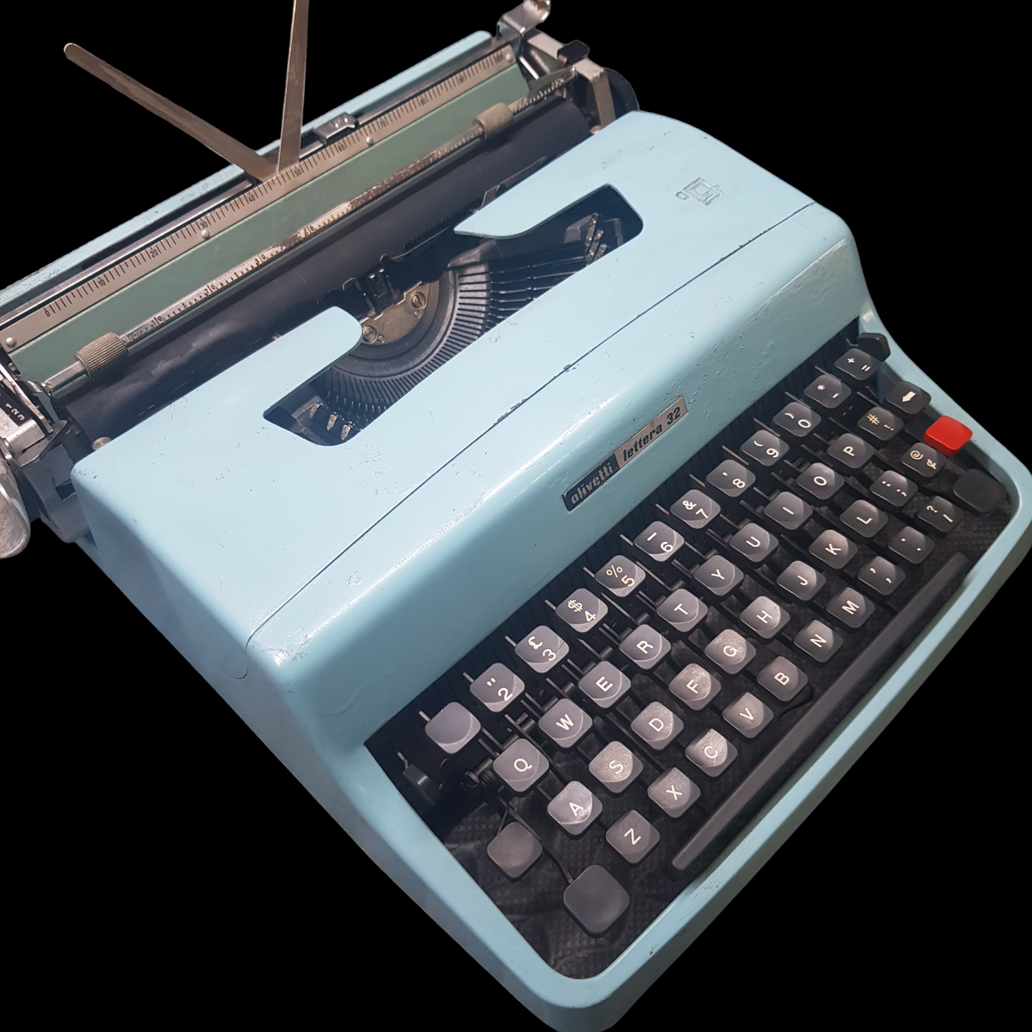 Image of Olivetti Lettera 32 Typewriter. Portable Typewriter. Original Blue. Italian Made. Available with cover. Available from universaltypewritercompany.in