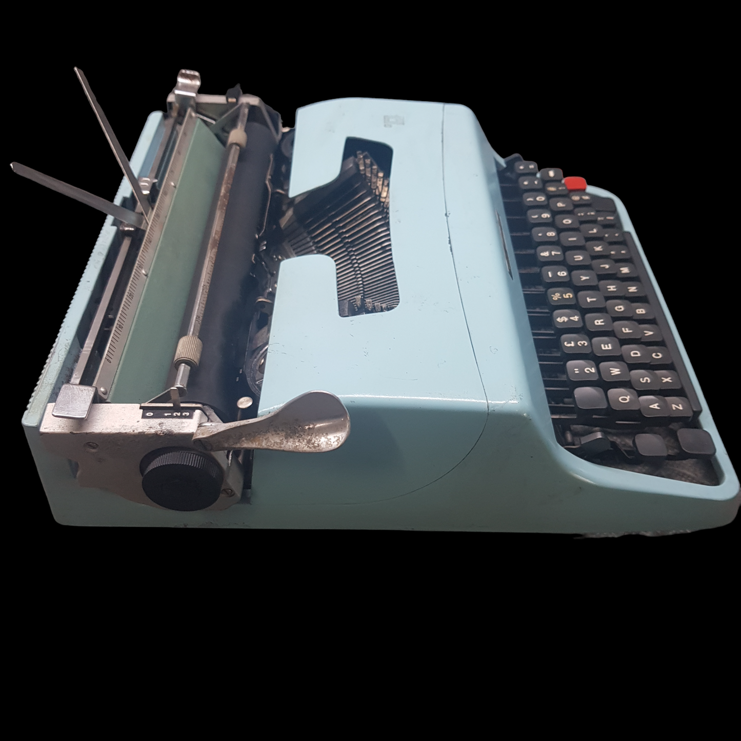 Image of Olivetti Lettera 32 Typewriter. Portable Typewriter. Original Blue. Italian Made. Available with cover. Available from universaltypewritercompany.in