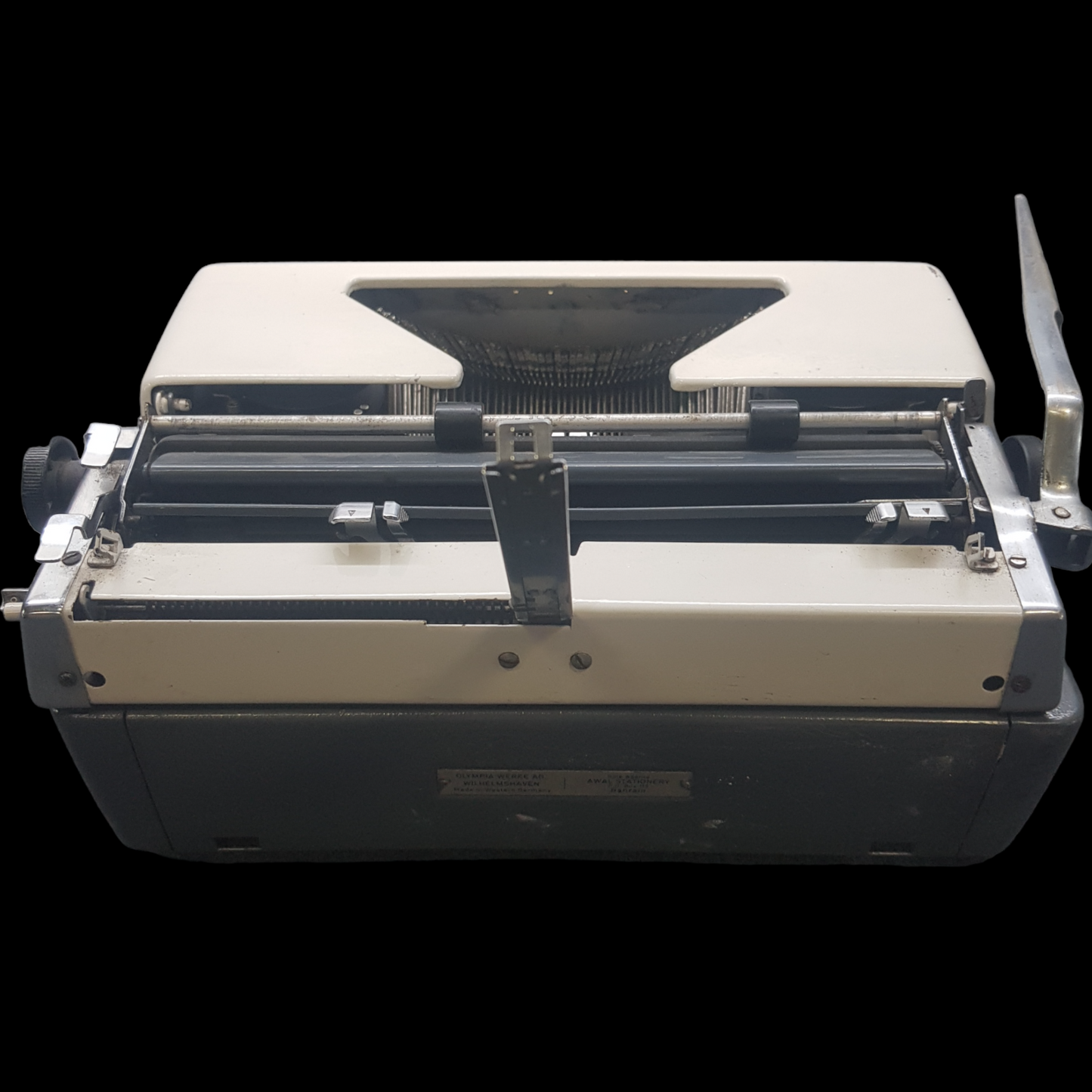 Image of Olympia SM Model Typewriter. Big Portable Typewriter. . Made in Germany. Available from universaltypewritercompany.in.