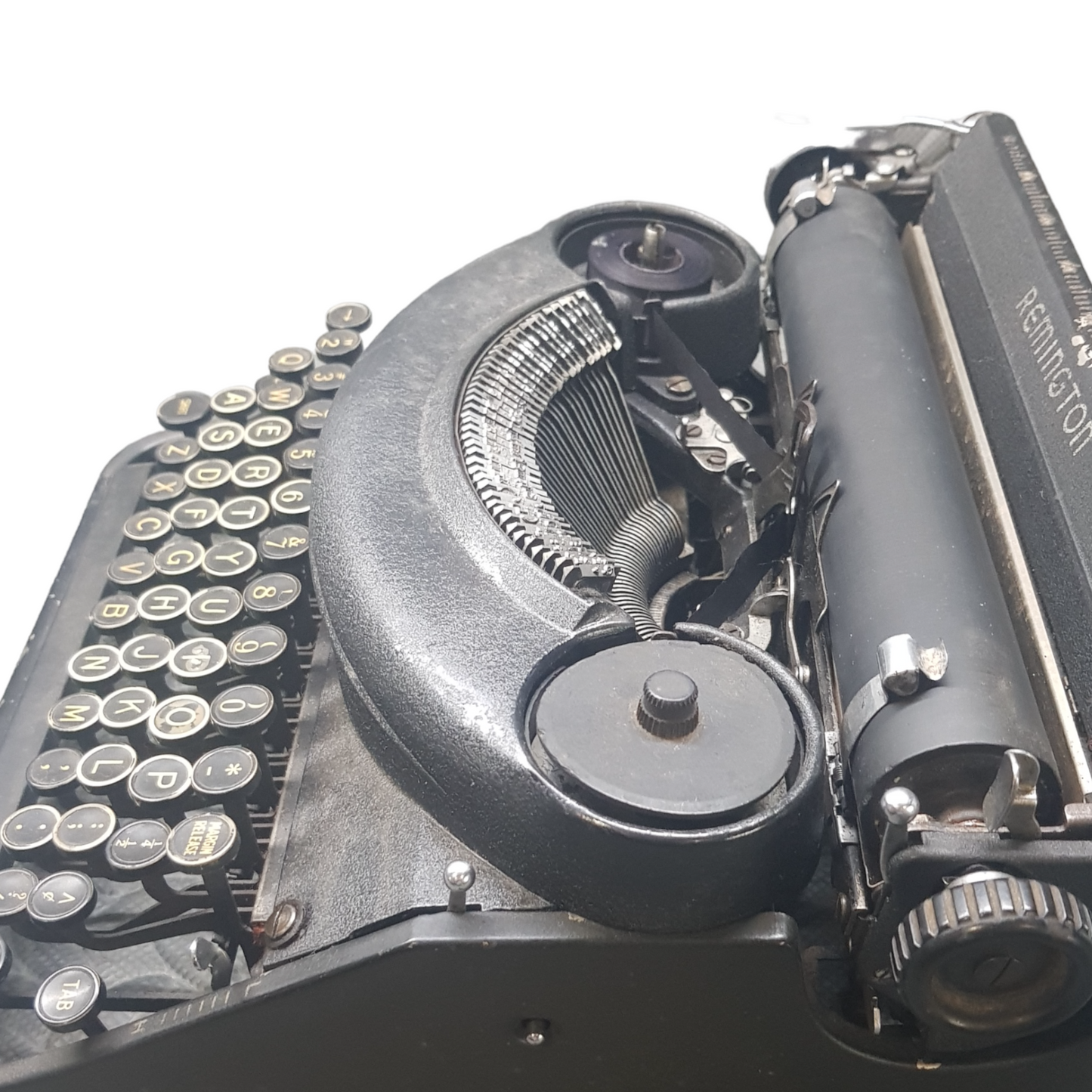 Image of Remington Noiseless Vintage Typewriter. A midsize, portable typewriter. Made in the USA with WW-II frame. Available from universaltypewritercompany.in.