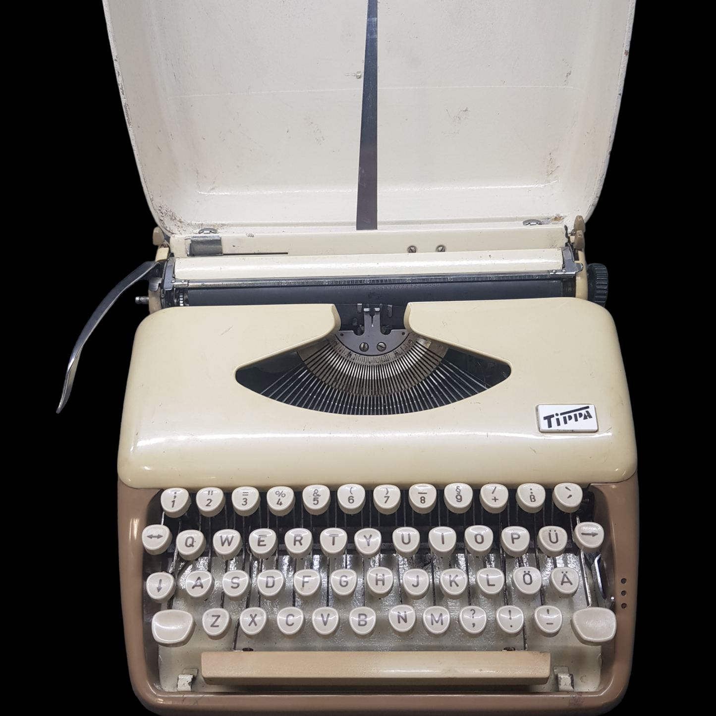 Image of Adler Tippa Portable Typewriter. Almost smallest portable typewriter. Made in Germany. Available from universaltypewritercompany.in