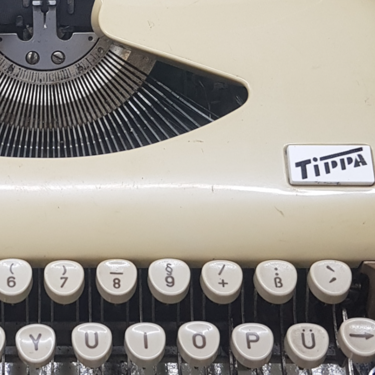Image of Adler Tippa Portable Typewriter. Almost smallest portable typewriter. Made in Germany. Available from universaltypewritercompany.in