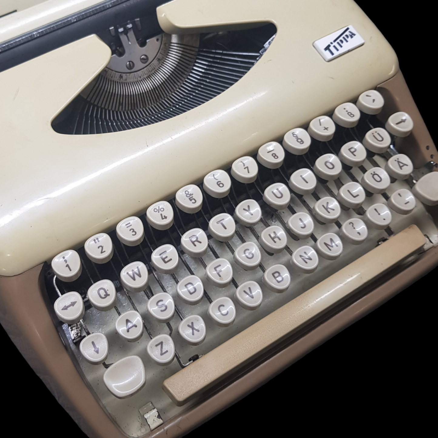 Image of Adler Tippa Portable Typewriter. Almost smallest portable typewriter. Made in Germany. Available from universaltypewritercompany.in