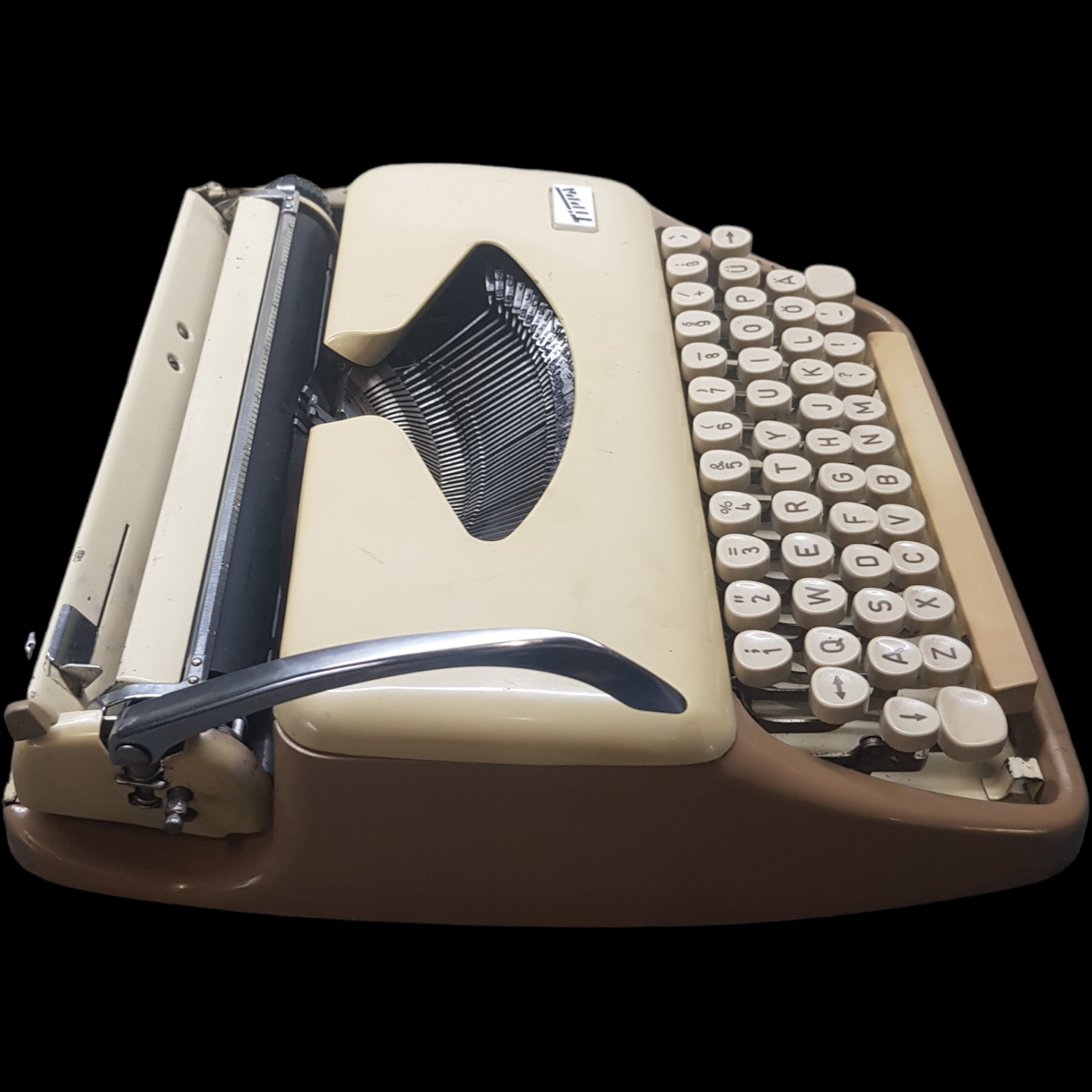 Image of Adler Tippa Portable Typewriter. Almost smallest portable typewriter. Made in Germany. Available from universaltypewritercompany.in