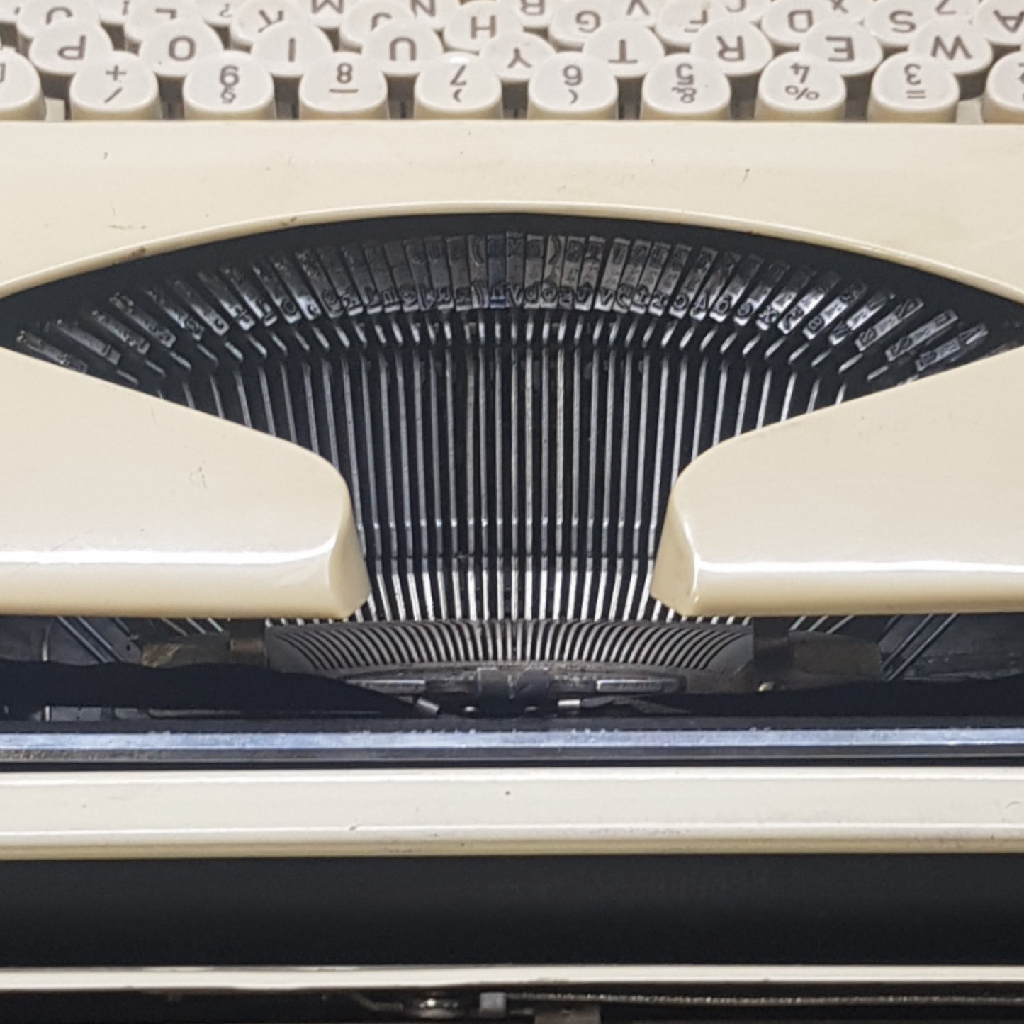 Image of Adler Tippa Portable Typewriter. Almost smallest portable typewriter. Made in Germany. Available from universaltypewritercompany.in
