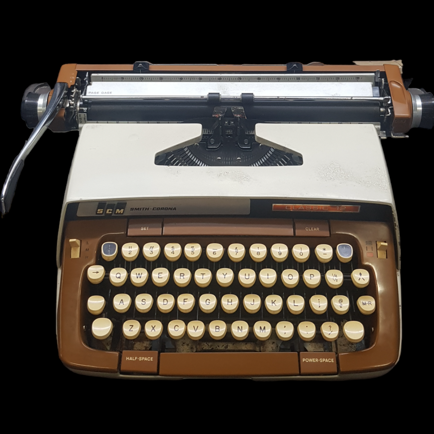 Image of SCM Smith Corona Classic Typewriter. A Big Portable typewriter. Made in the USA. Available from Universal Typewriter Company.