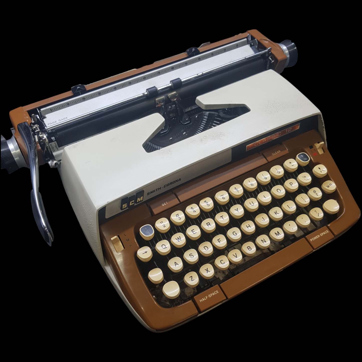 Image of SCM Smith Corona Classic Typewriter. A Big Portable typewriter. Made in the USA. Available from Universal Typewriter Company.
