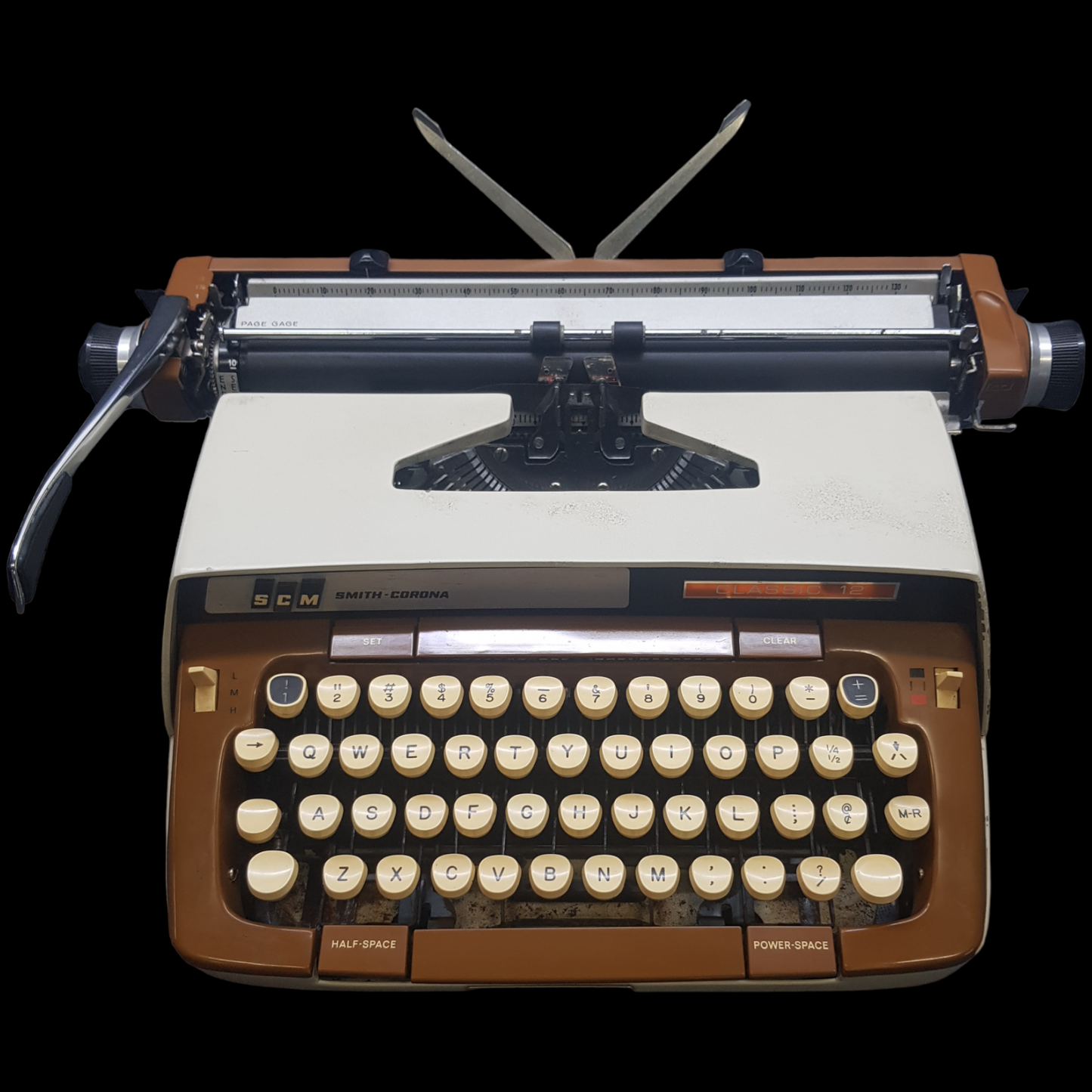 Image of SCM Smith Corona Classic Typewriter. A Big Portable typewriter. Made in the USA. Available from Universal Typewriter Company.