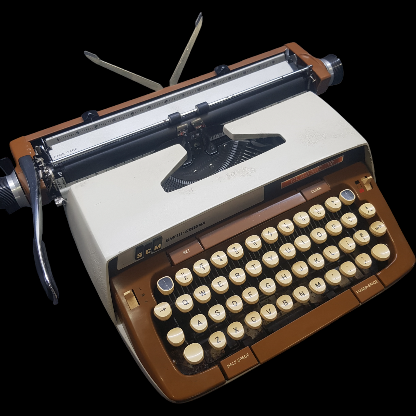 Image of SCM Smith Corona Classic Typewriter. A Big Portable typewriter. Made in the USA. Available from Universal Typewriter Company.