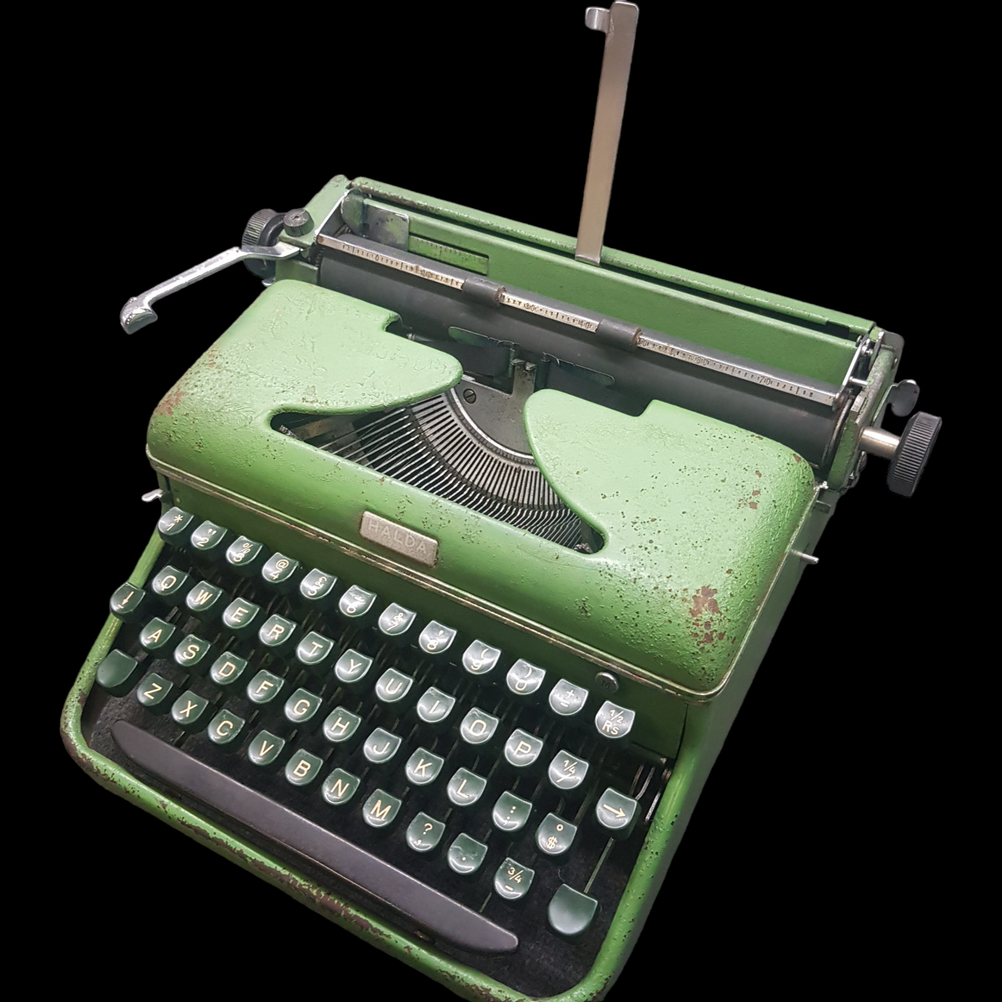 Image of Halda Typewriter. A Rare Portable Typewriter. Assembled in India. Available from Universal Typewriter Company.