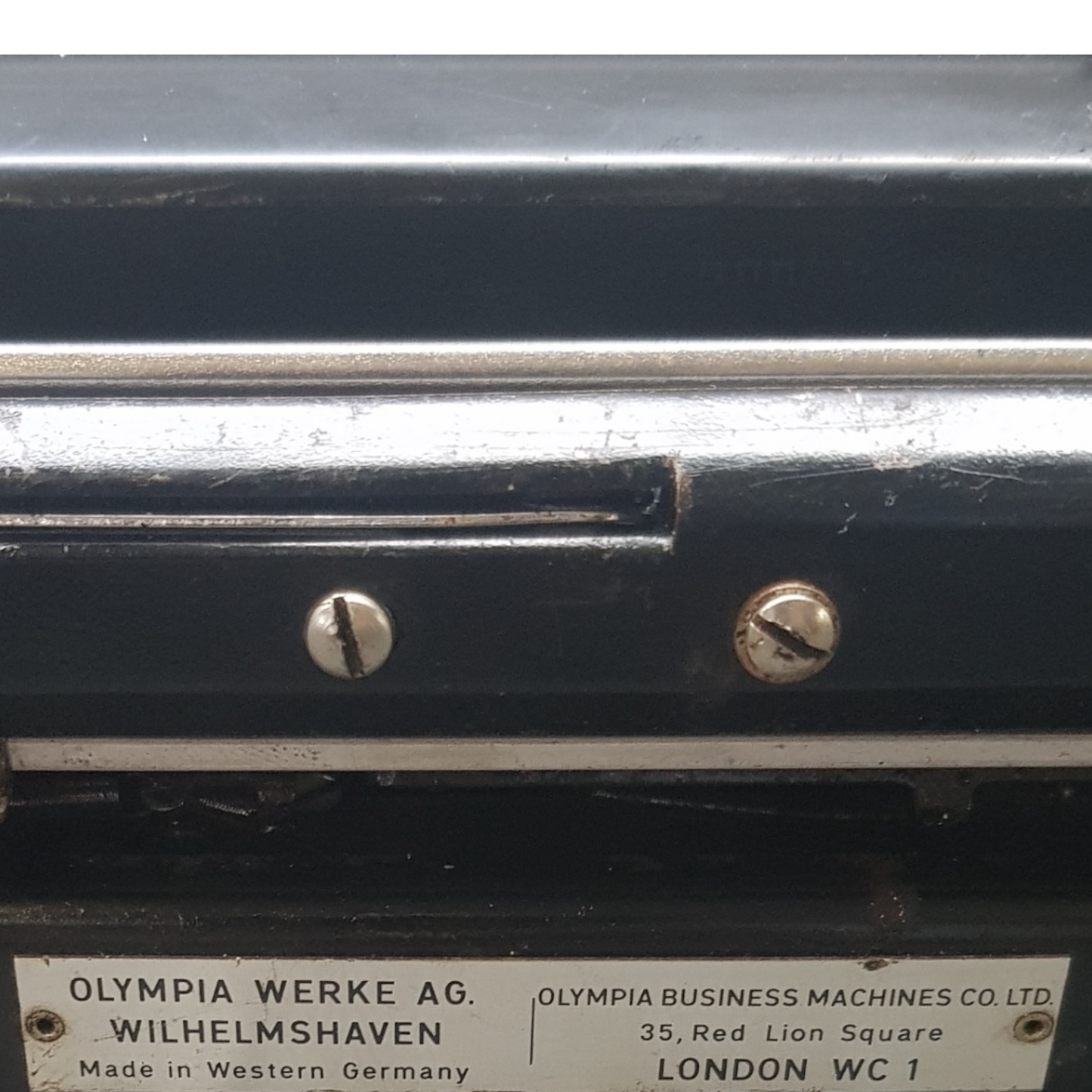 Image of Olympia Splendid Portable Typewriter. Almost smallest portable typewriter. Made in Germany. Available from universaltypewritercompany.in.