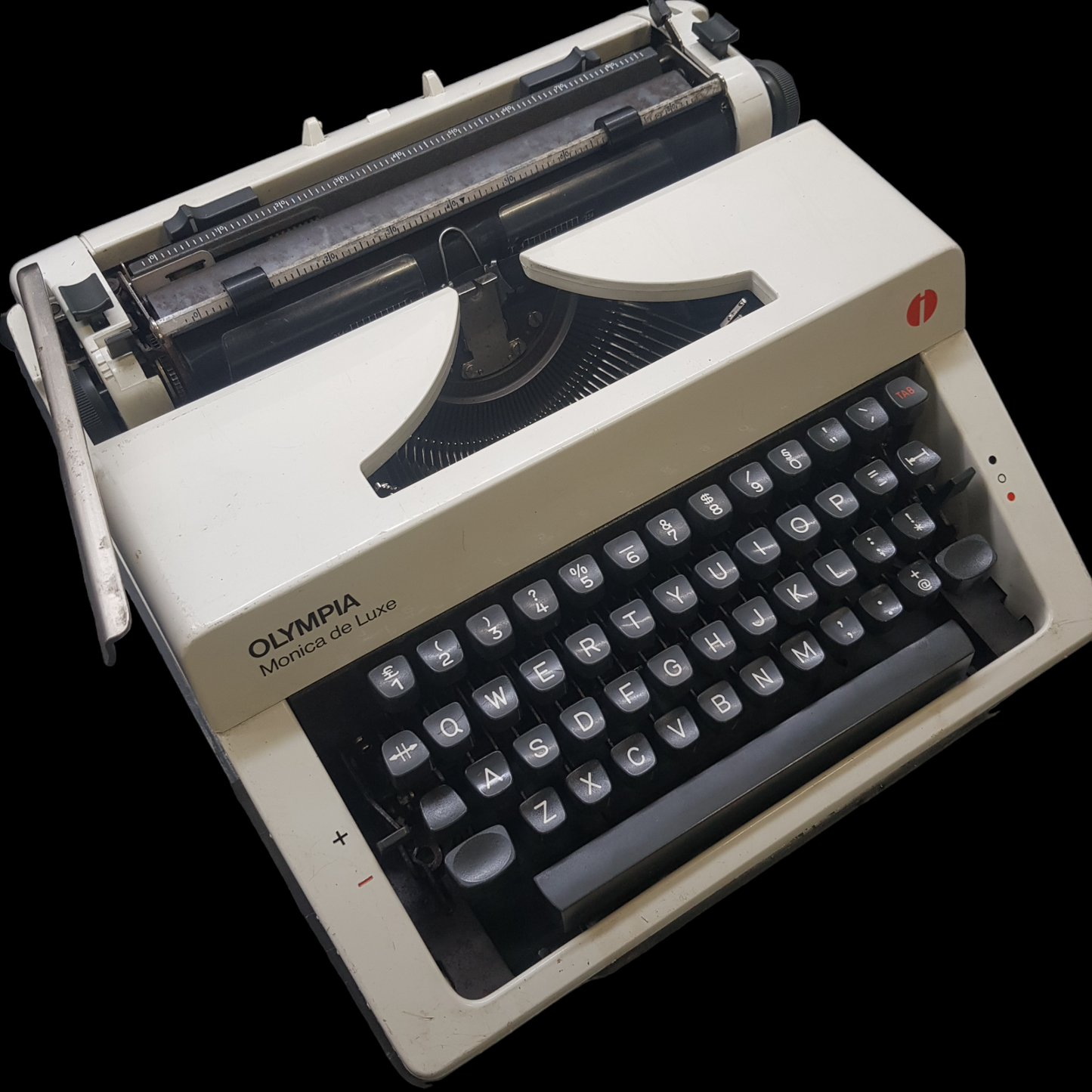 Image of Olympia Monica DLX Typewriter. A Midsize Portable Typewriter. Made in Germany. Fibre Body. Available from universaltypewritercompany.in.