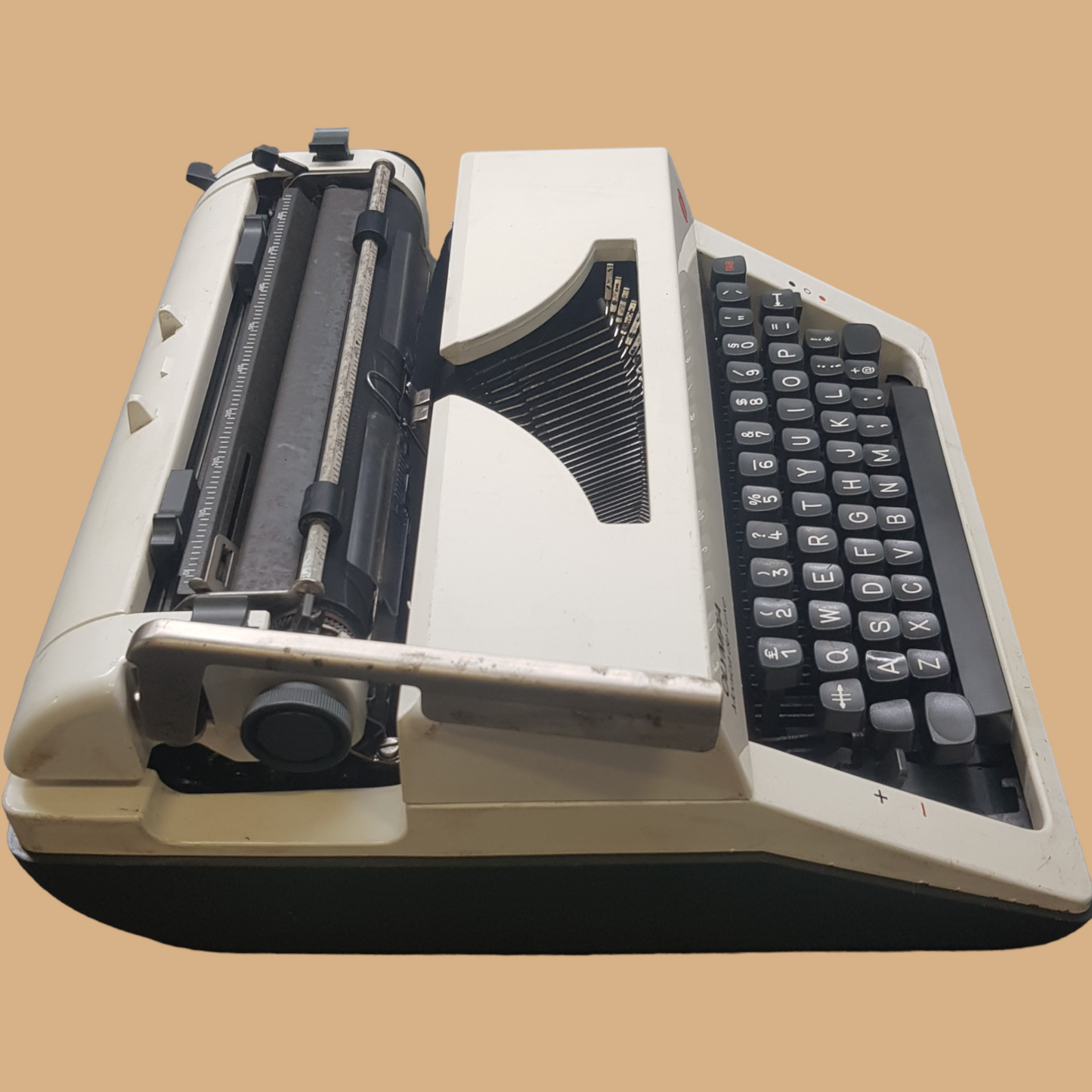 Image of Olympia Monica DLX Typewriter. A Midsize Portable Typewriter. Made in Germany. Fibre Body. Available from universaltypewritercompany.in.