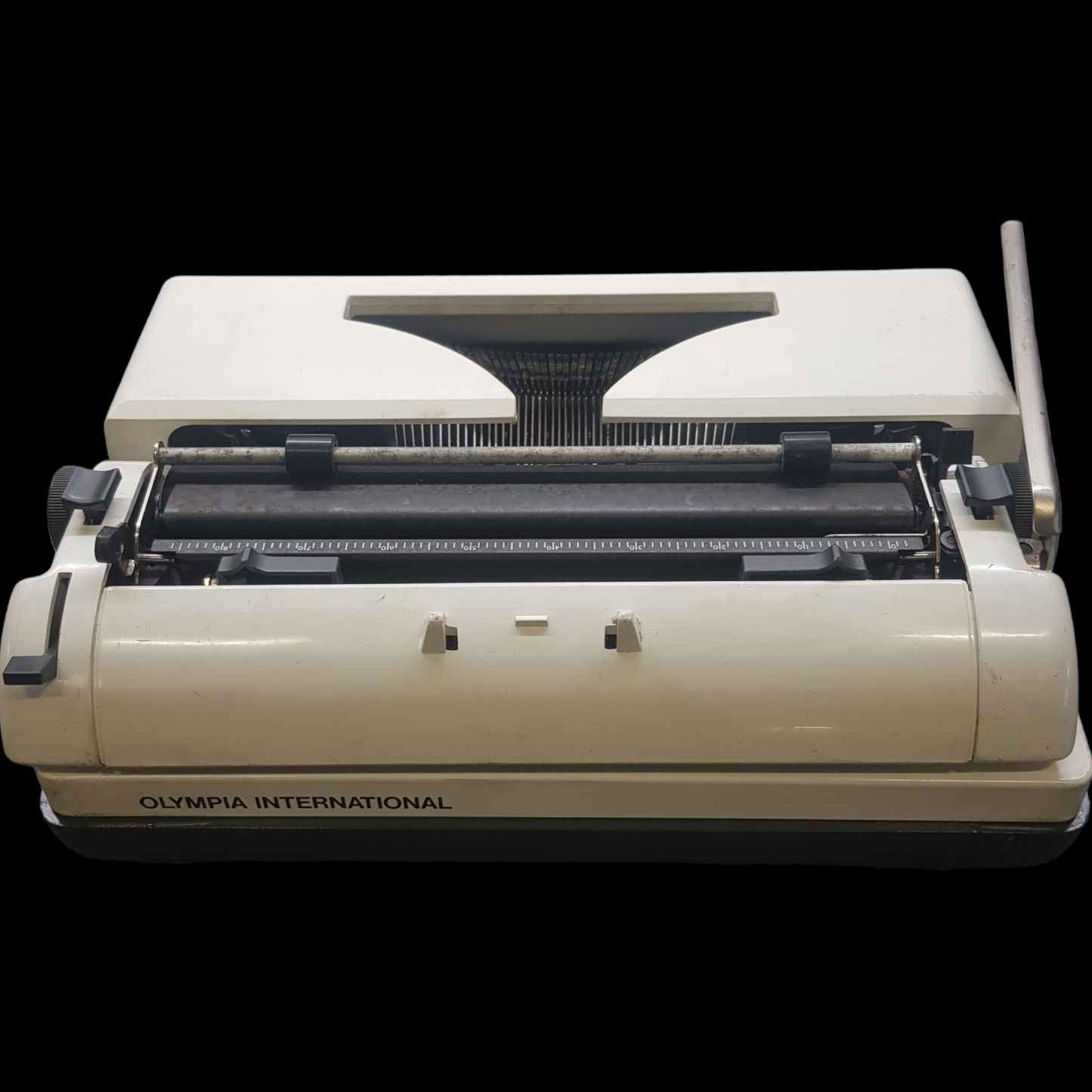 Image of Olympia Monica DLX Typewriter. A Midsize Portable Typewriter. Made in Germany. Fibre Body. Available from universaltypewritercompany.in.