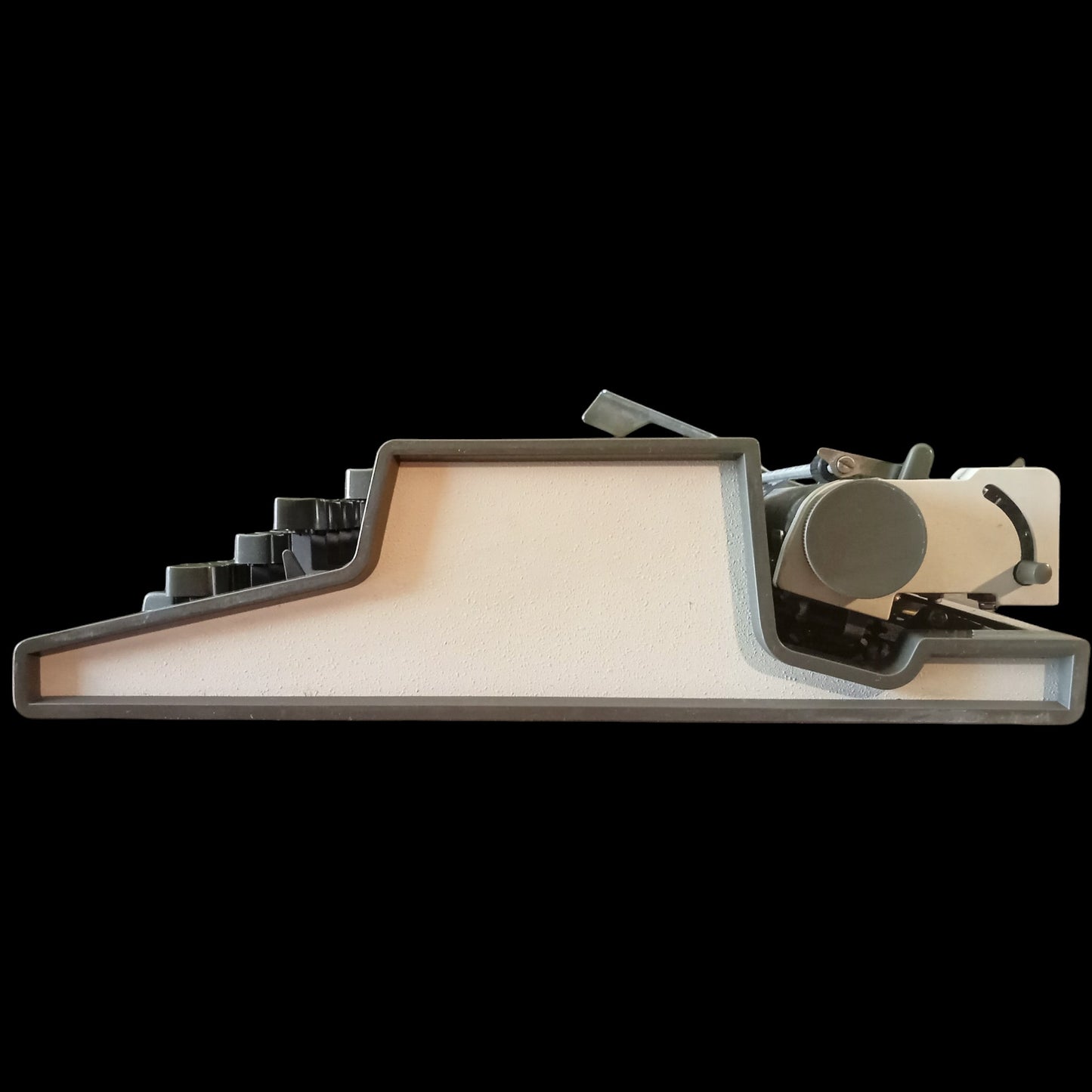 Image of Olympia Traveller De Luxe Typewriter. Available from universaltypewritercompany.in
