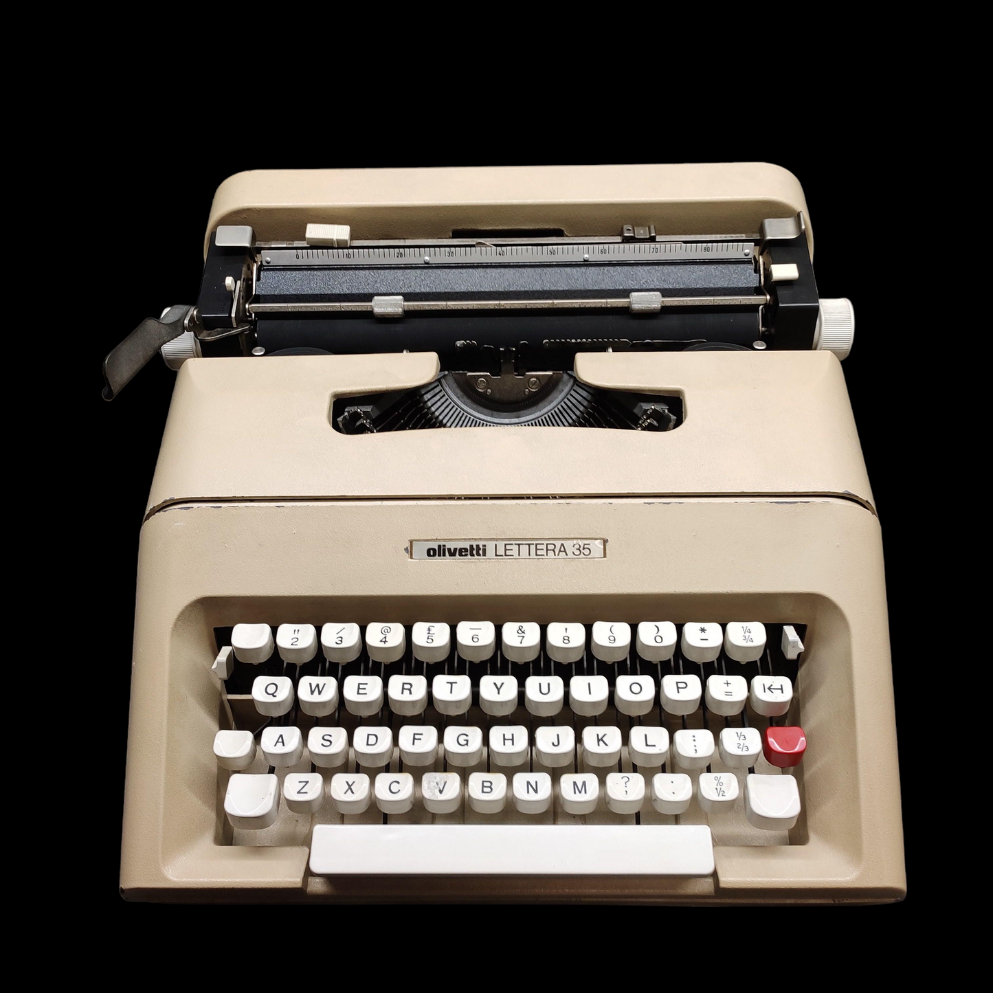 Image of Olivetti Lettera 35 Typewriter. Portable Typewriter. Made in Europe. Available with cover. Available from universaltypewritercompany.in