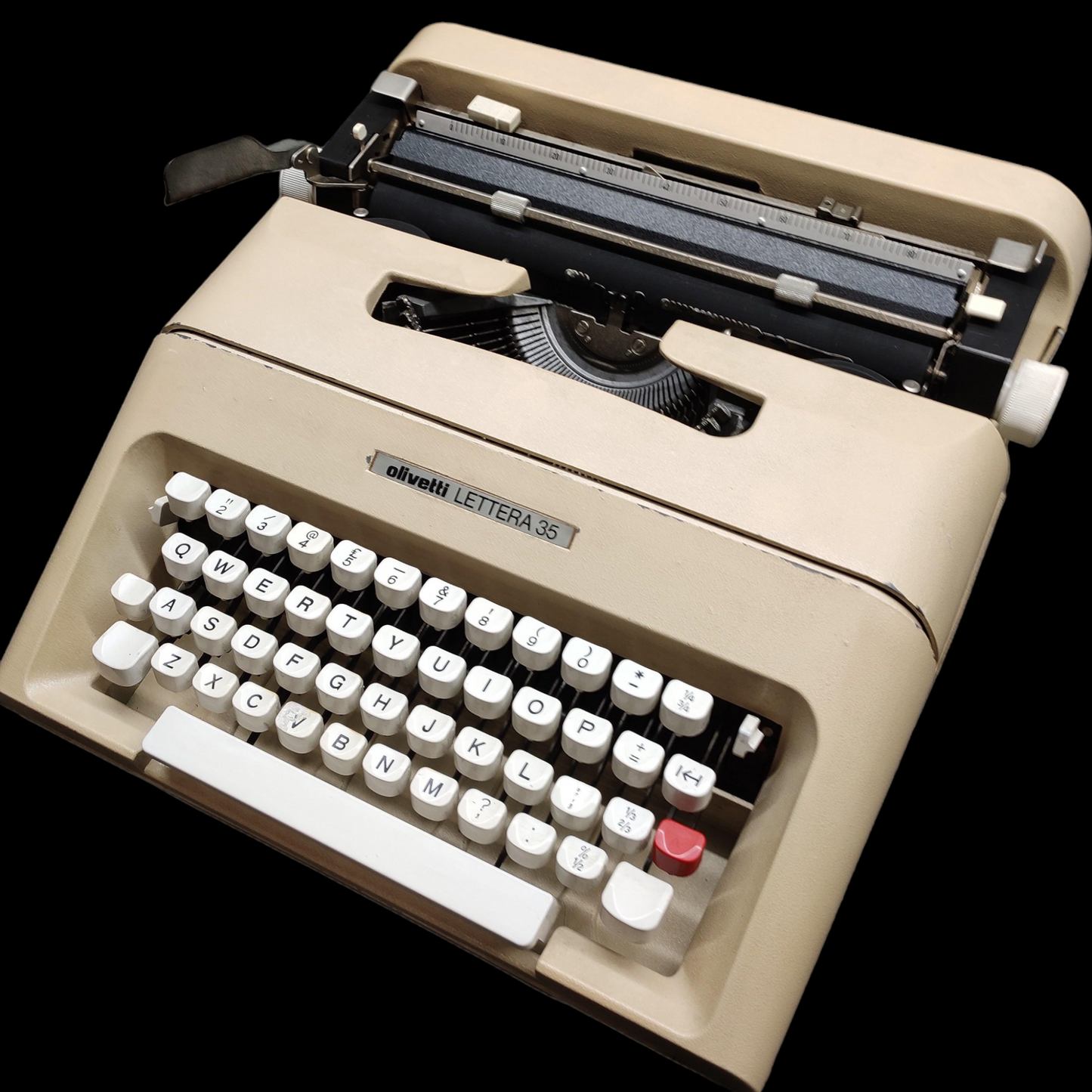 Image of Olivetti Lettera 35 Typewriter. Portable Typewriter. Made in Europe. Available with cover. Available from universaltypewritercompany.in