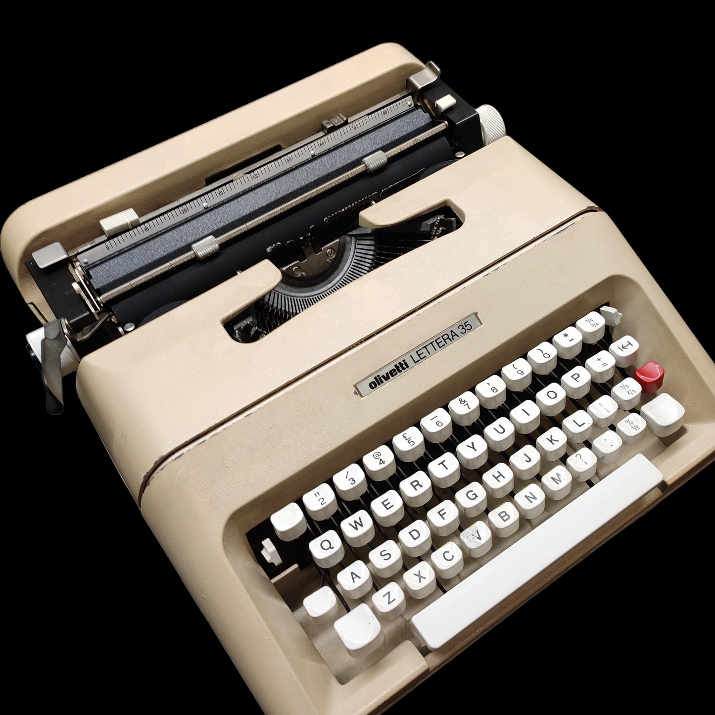 Image of Olivetti Lettera 35 Typewriter. Portable Typewriter. Made in Europe. Available with cover. Available from universaltypewritercompany.in