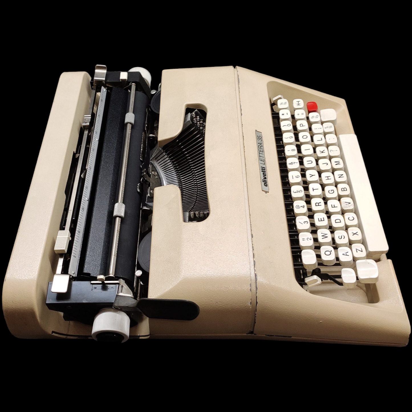 Image of Olivetti Lettera 35 Typewriter. Portable Typewriter. Made in Europe. Available with cover. Available from universaltypewritercompany.in