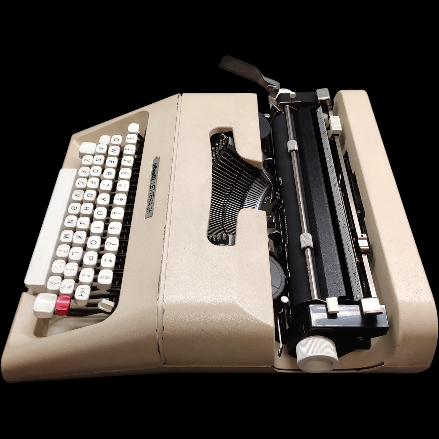 Image of Olivetti Lettera 35 Typewriter. Portable Typewriter. Made in Europe. Available with cover. Available from universaltypewritercompany.in