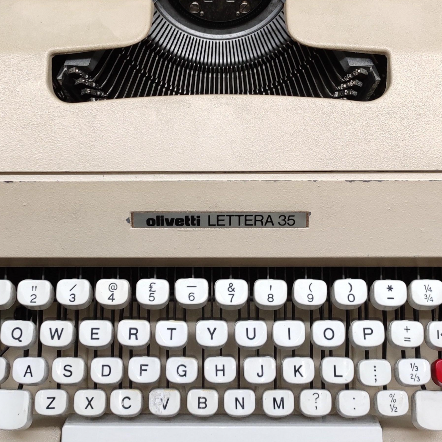 Image of Olivetti Lettera 35 Typewriter. Portable Typewriter. Made in Europe. Available with cover. Available from universaltypewritercompany.in
