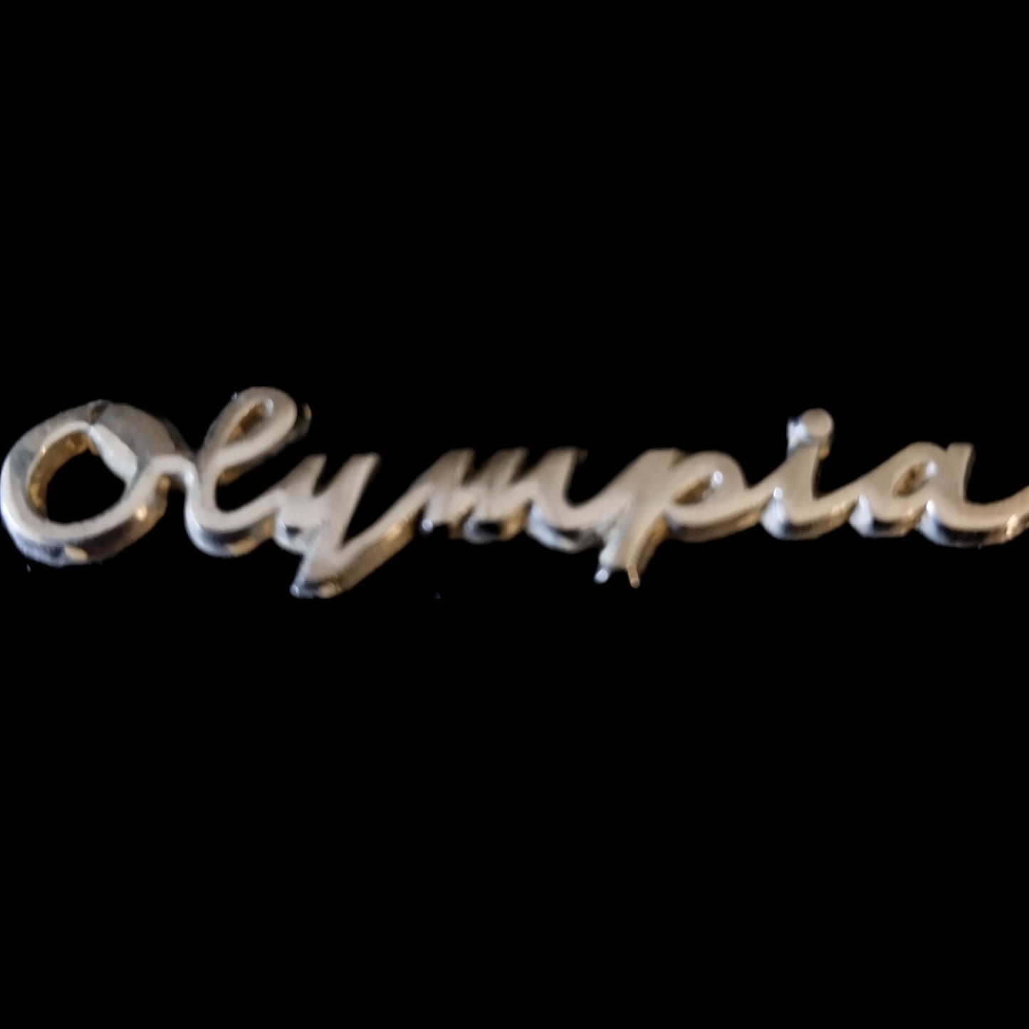 Image of Olympia Port SF DLX Typewriter. Available from universaltypewritercompany.in