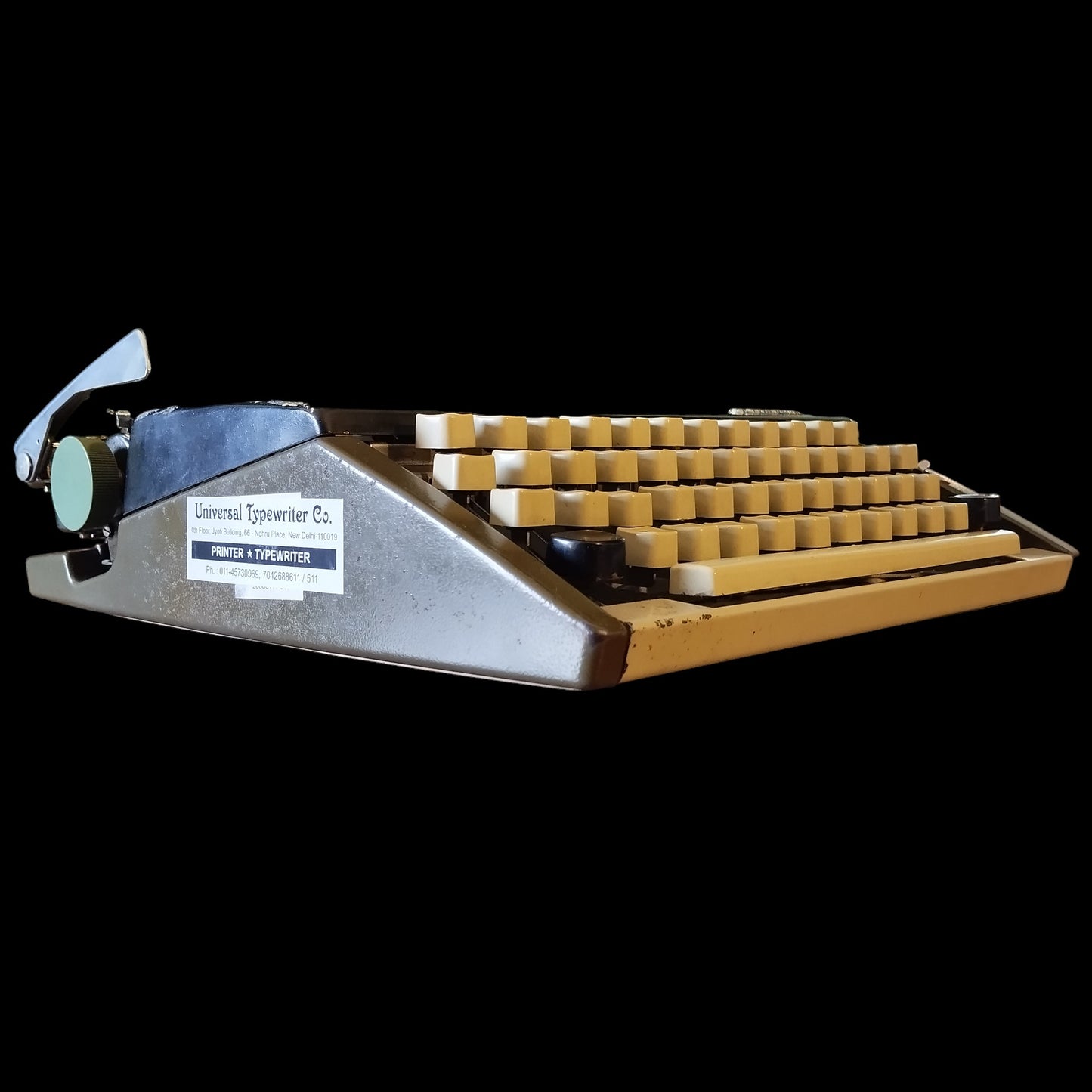 Image of Olympia Port SF DLX Typewriter. Available from universaltypewritercompany.in