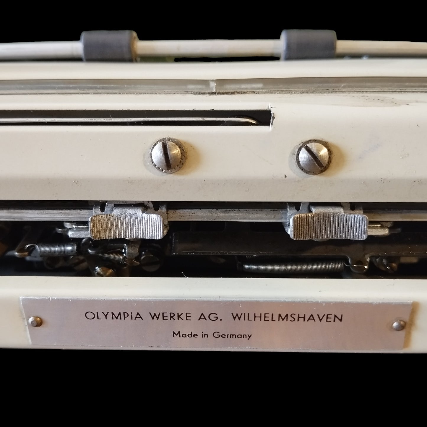 Image of Olympia Port SF DLX Typewriter. Available from universaltypewritercompany.in