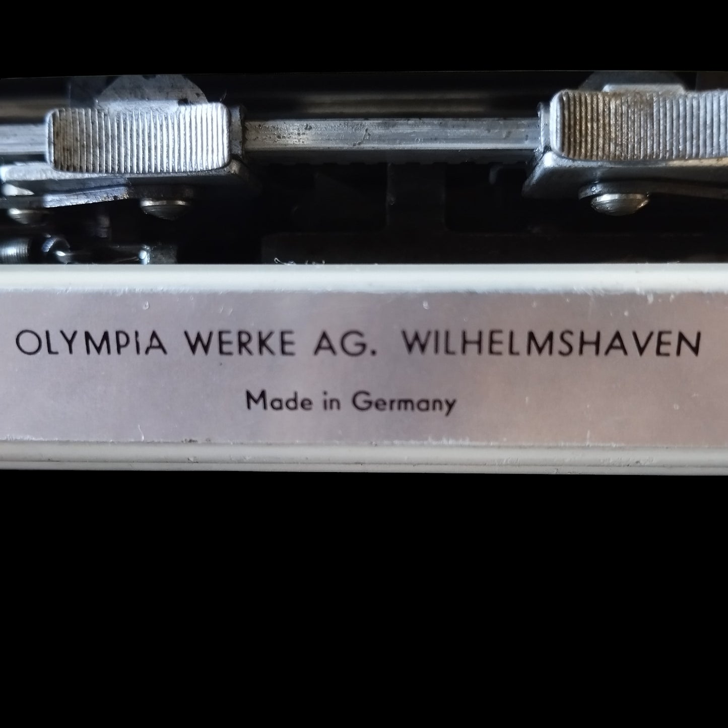 Image of Olympia Port SF DLX Typewriter. Available from universaltypewritercompany.in