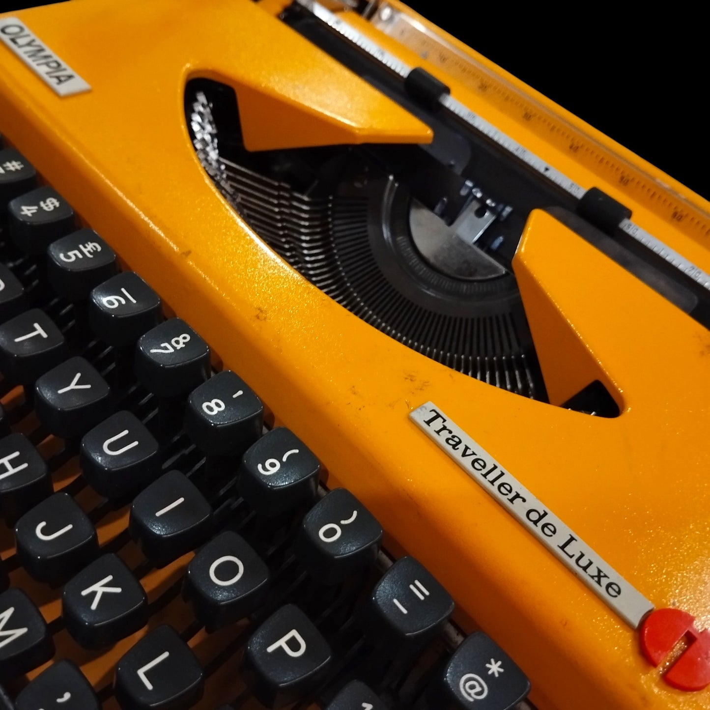 Image of Olympia Traveller De Luxe Typewriter. Available from universaltypewritercompany.in