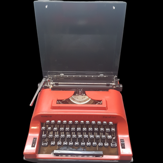 Image of Remington Travelriter Typewriter. Portable Typewriter. Made in Fibre. Available with Black Carry Cover from universaltypewritercompany.in