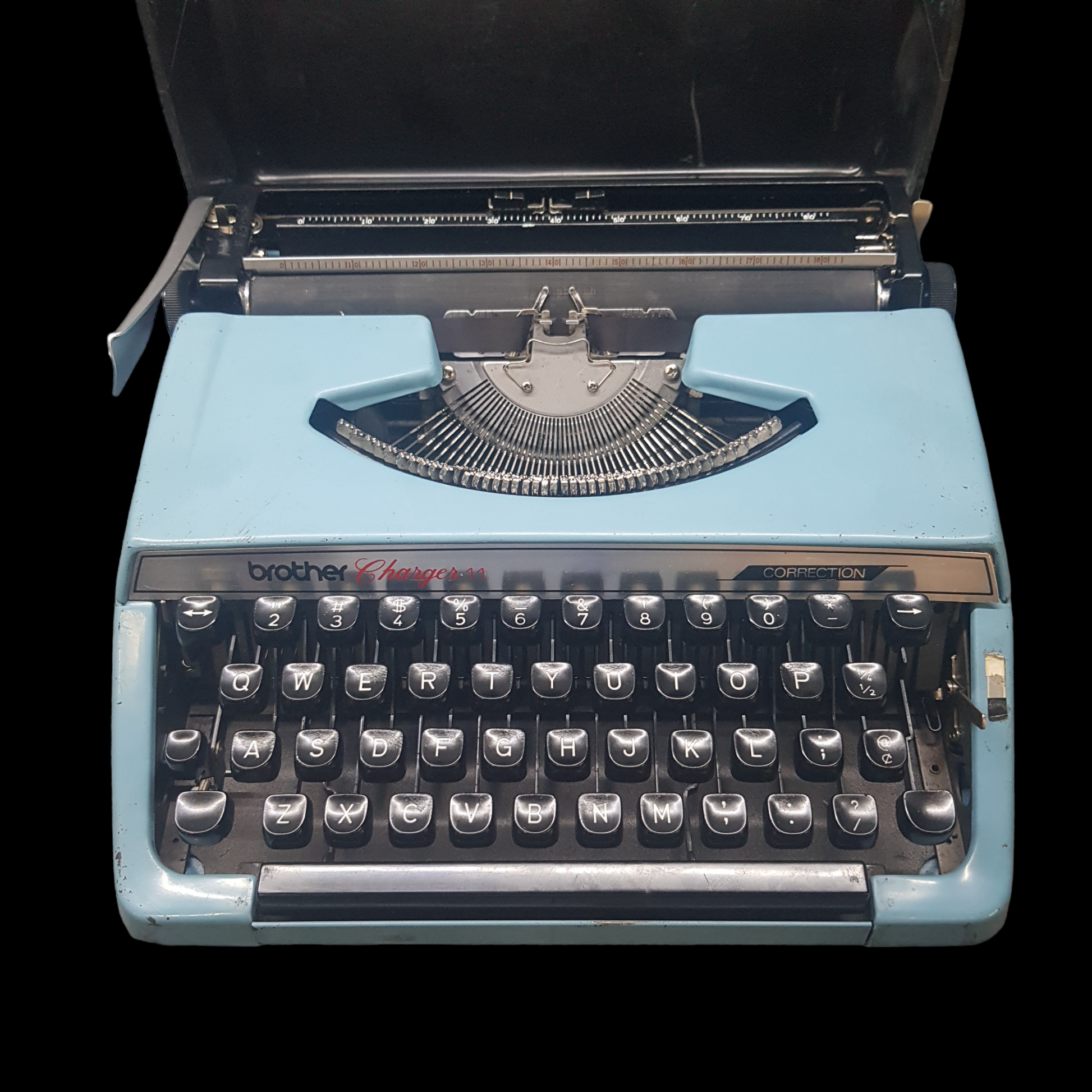 Image of Brother Charger 11 Typewriter. Portable Typewriter. Original Blue. Made in Japan. Available from universaltypewritercompany.in.