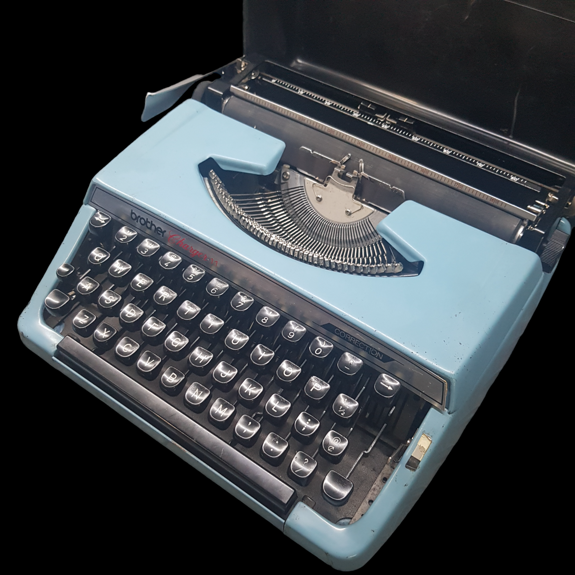 Image of Brother Charger 11 Typewriter. Portable Typewriter. Original Blue. Made in Japan. Available from universaltypewritercompany.in.