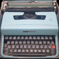 Image of Olivetti Lettera 32 Typewriter. Portable Typewriter. Original Blue. Italian Made. Available with cover. Available from universaltypewritercompany.in