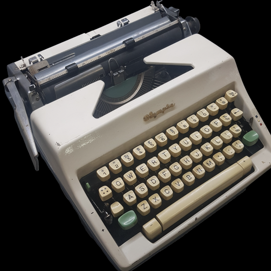 Image of Olympia SM Model Typewriter. Big Portable Typewriter. . Made in Germany. Available from universaltypewritercompany.in.