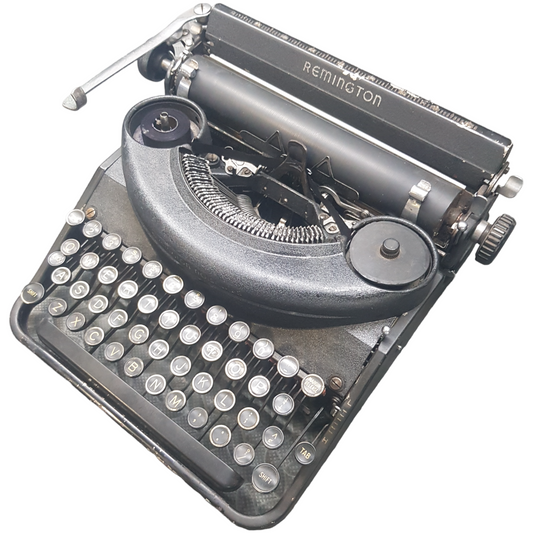 Image of Remington Noiseless Vintage Typewriter. A midsize, portable typewriter. Made in the USA with WW-II frame. Available from universaltypewritercompany.in.