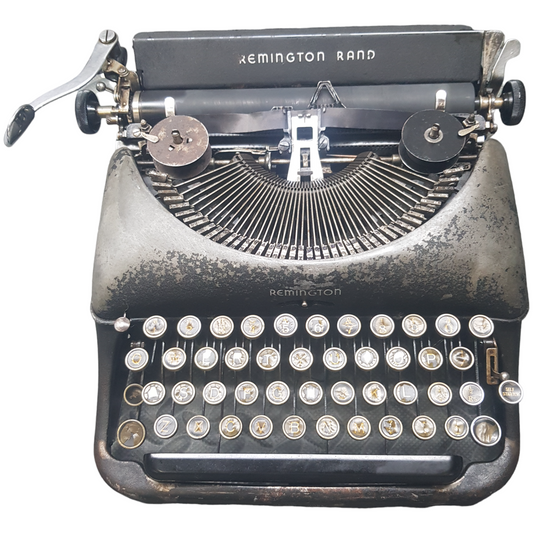 Image of Remington 5 Model Typewriter. A mid Size Portable Typewriter. Made in the USA. Available from Universal Typewriter Company.