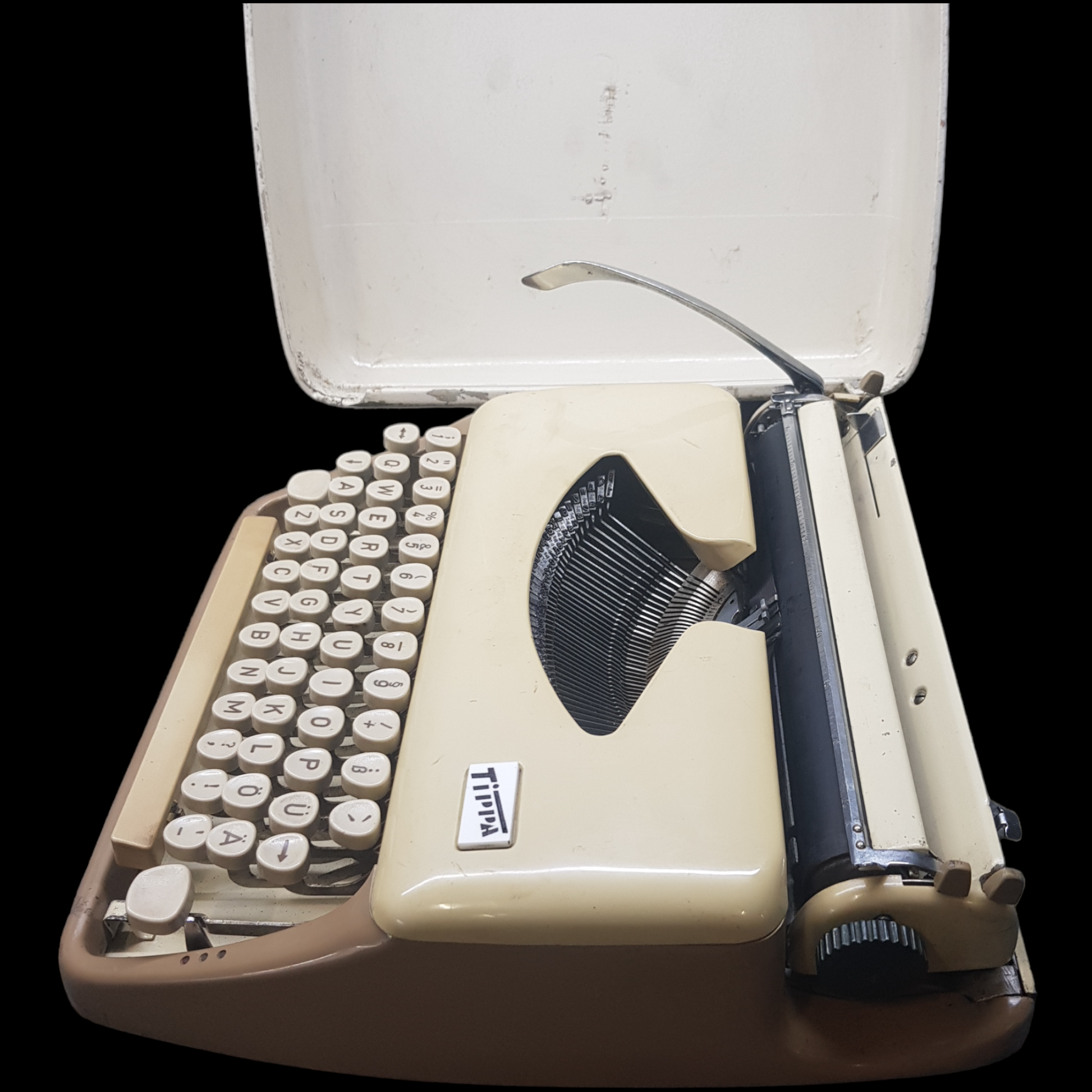 Image of Adler Tippa Portable Typewriter. Almost smallest portable typewriter. Made in Germany. Available from universaltypewritercompany.in