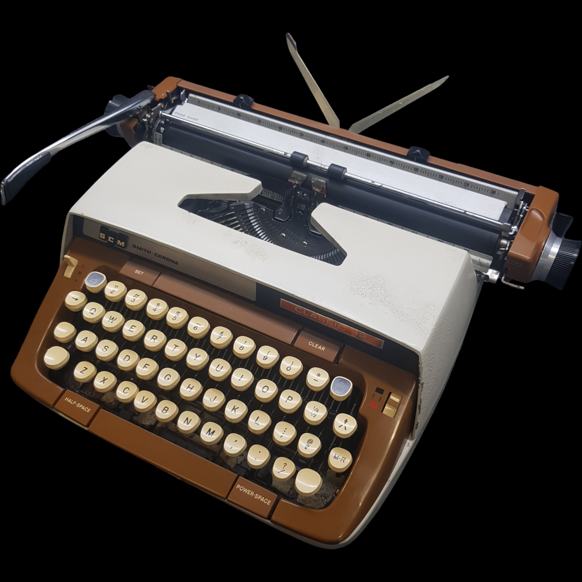 Image of SCM Smith Corona Classic Typewriter. A Big Portable typewriter. Made in the USA. Available from Universal Typewriter Company.