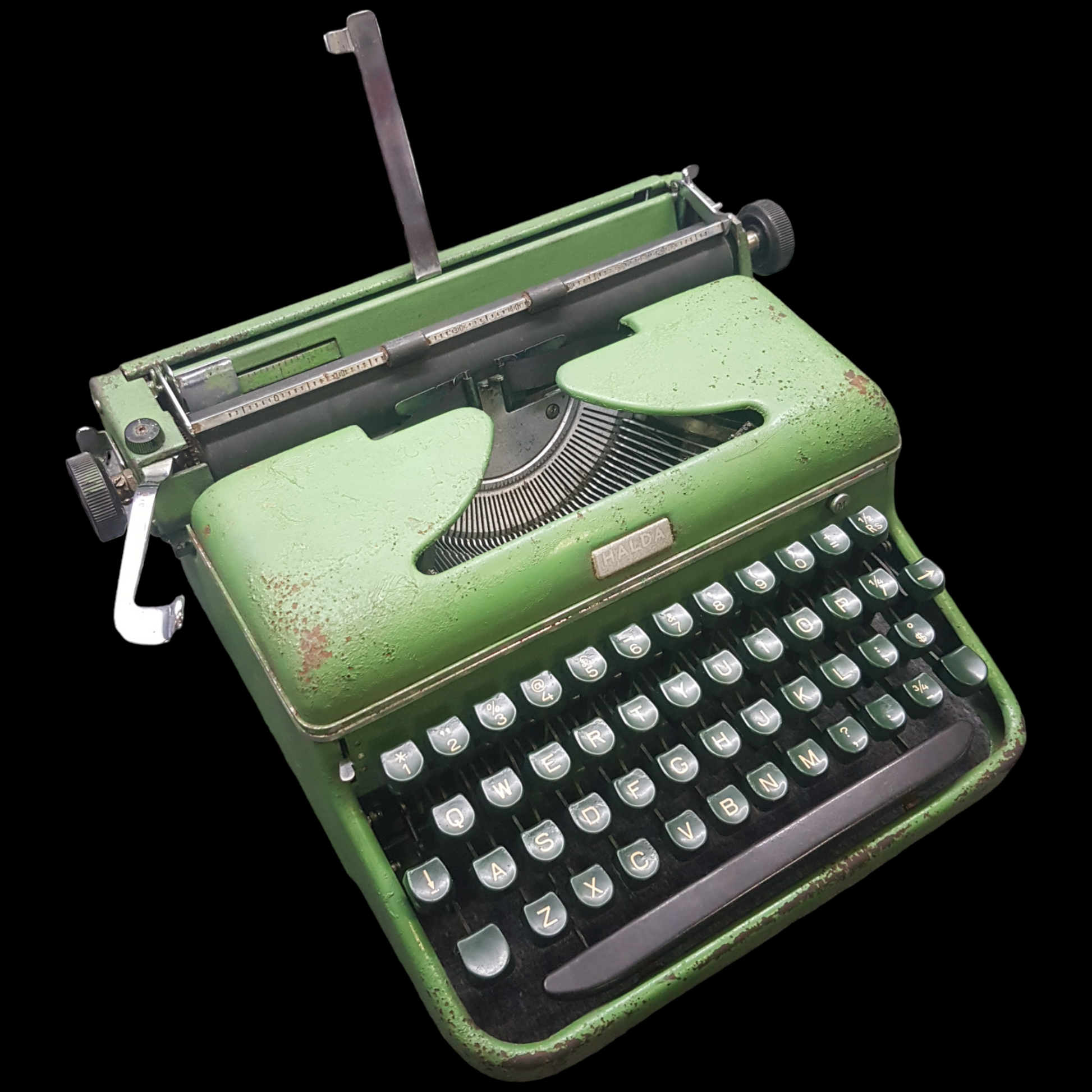Image of Halda Typewriter. A Rare Portable Typewriter. Assembled in India. Available from Universal Typewriter Company.