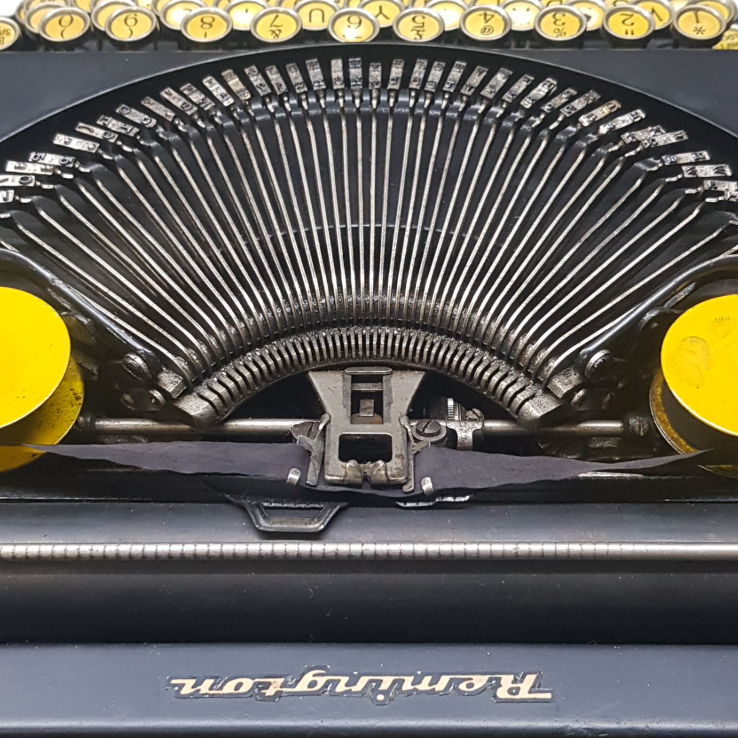 Image of Remington Mode 2 Lifting Typewriter. A Rare Antique Century old Metal Keyring Portable Typewriter. Made in the USA. Available from Universal Typewriter Company.