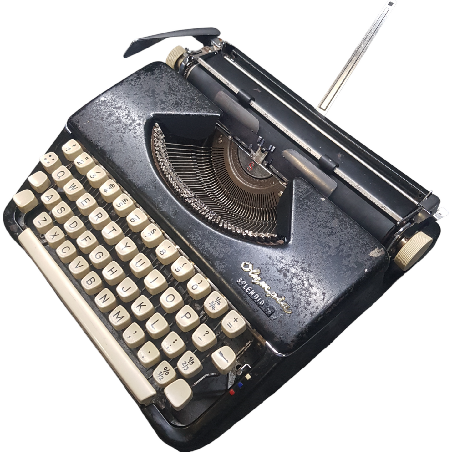 Image of Olympia Splendid Portable Typewriter. Almost smallest portable typewriter. Made in Germany. Available from universaltypewritercompany.in.