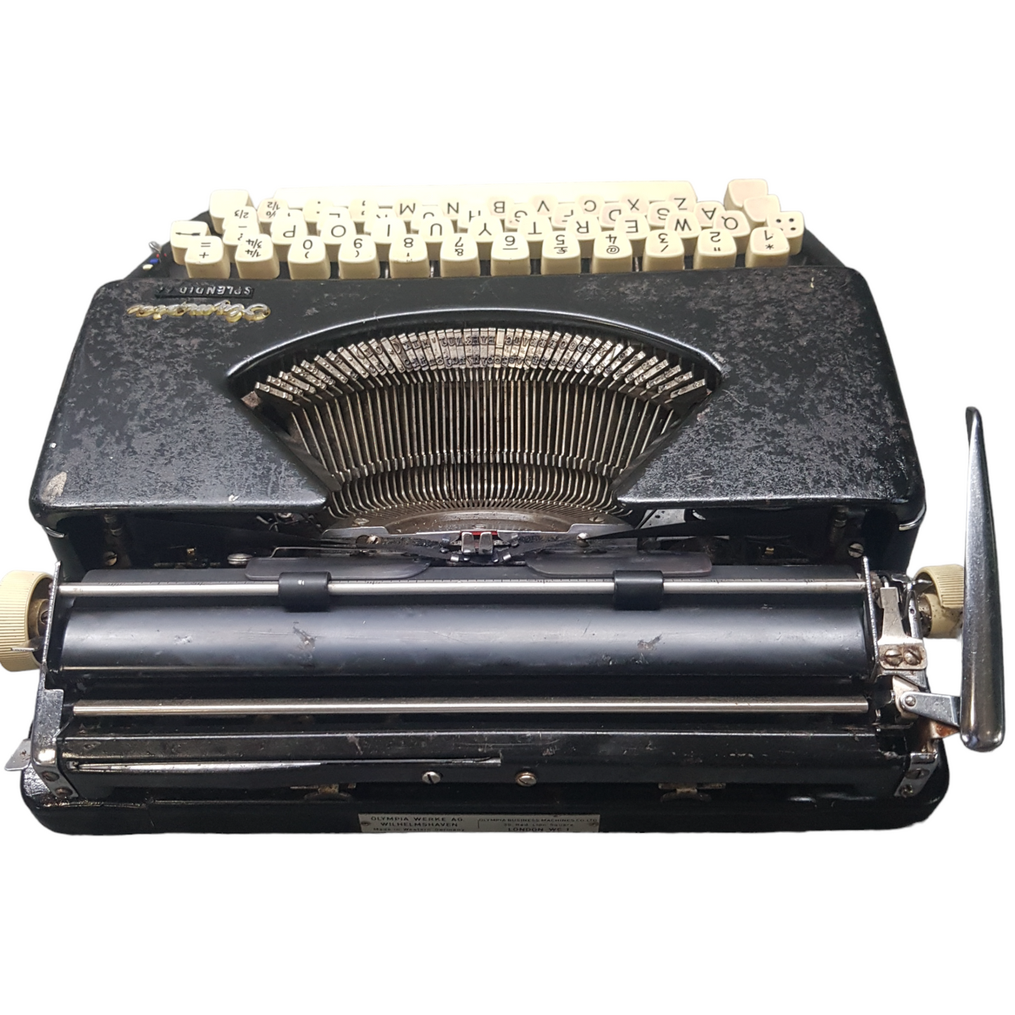 Image of Olympia Splendid Portable Typewriter. Almost smallest portable typewriter. Made in Germany. Available from universaltypewritercompany.in.