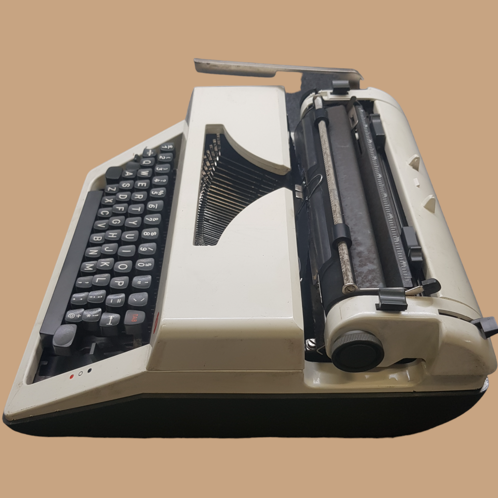 Image of Olympia Monica DLX Typewriter. A Midsize Portable Typewriter. Made in Germany. Fibre Body. Available from universaltypewritercompany.in.