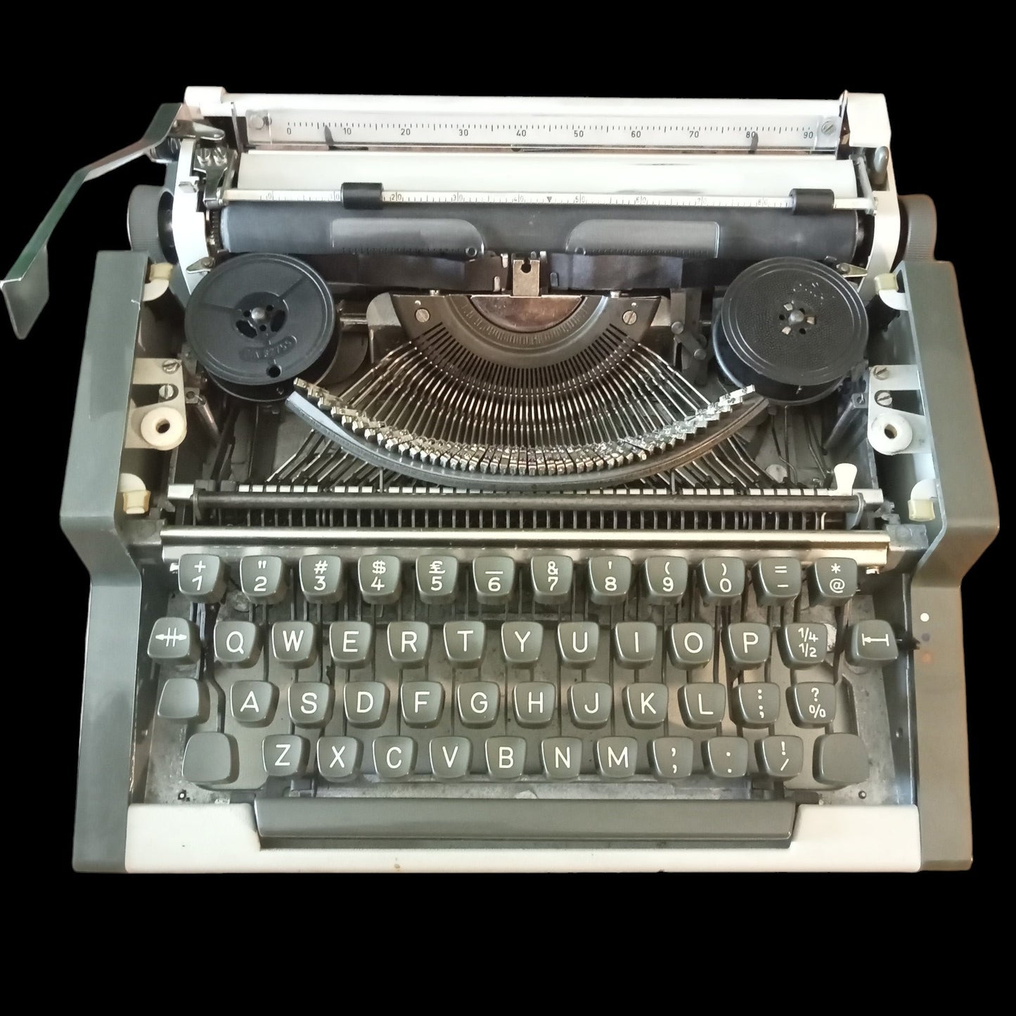 Image of Olympia Traveller De Luxe Typewriter. Available from universaltypewritercompany.in