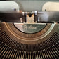 Image of Olympia Port SF DLX Typewriter. Available from universaltypewritercompany.in