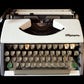 Image of Olympia Port SF DLX Typewriter. Available from universaltypewritercompany.in