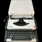 Image of Olympia Traveller De Luxe Typewriter. Available from universaltypewritercompany.in